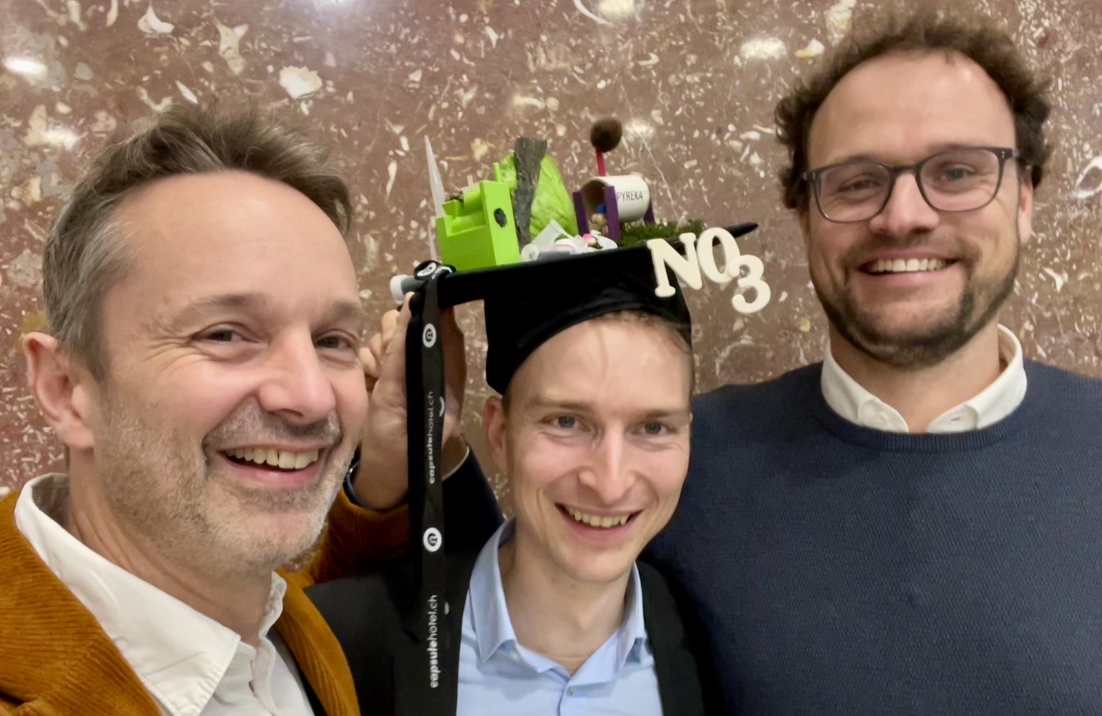 Prof. Dr. Daniel Kray, Dr. Jannis Grafmüller und Dr. Nikolas Hagemann nach der Disputation